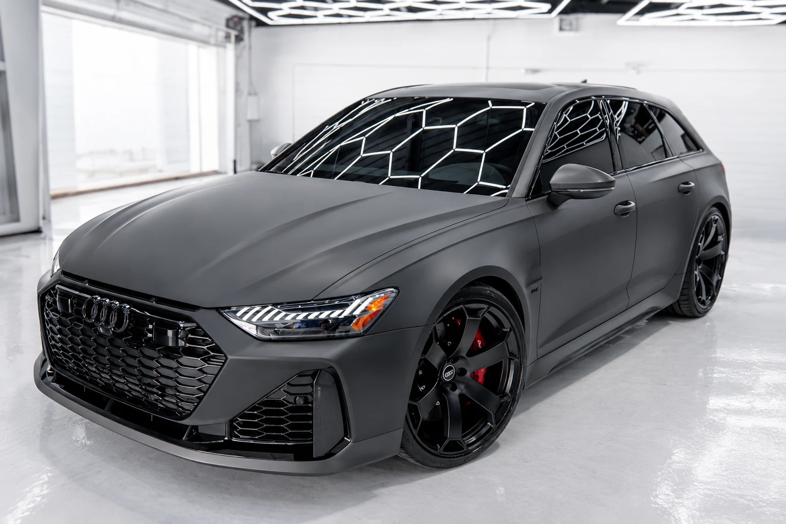AI illustration of our graphite-gray Audi with a matte finish and soft, diffuse reflections